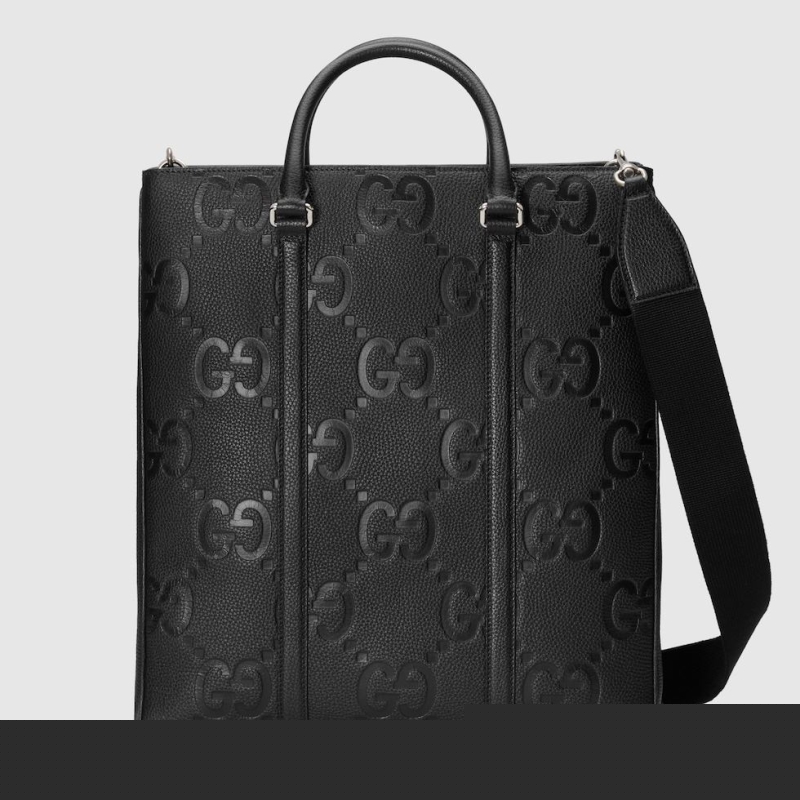 G*u*i shopping bags